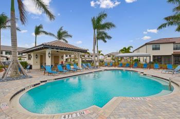 Swimming Pool And Relaxing Area at Fiore Townhomes, Venice, FL